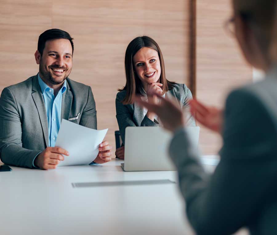 Contingent search — ATG Partners finance recruiters interviewing a candidate for a success-fee search