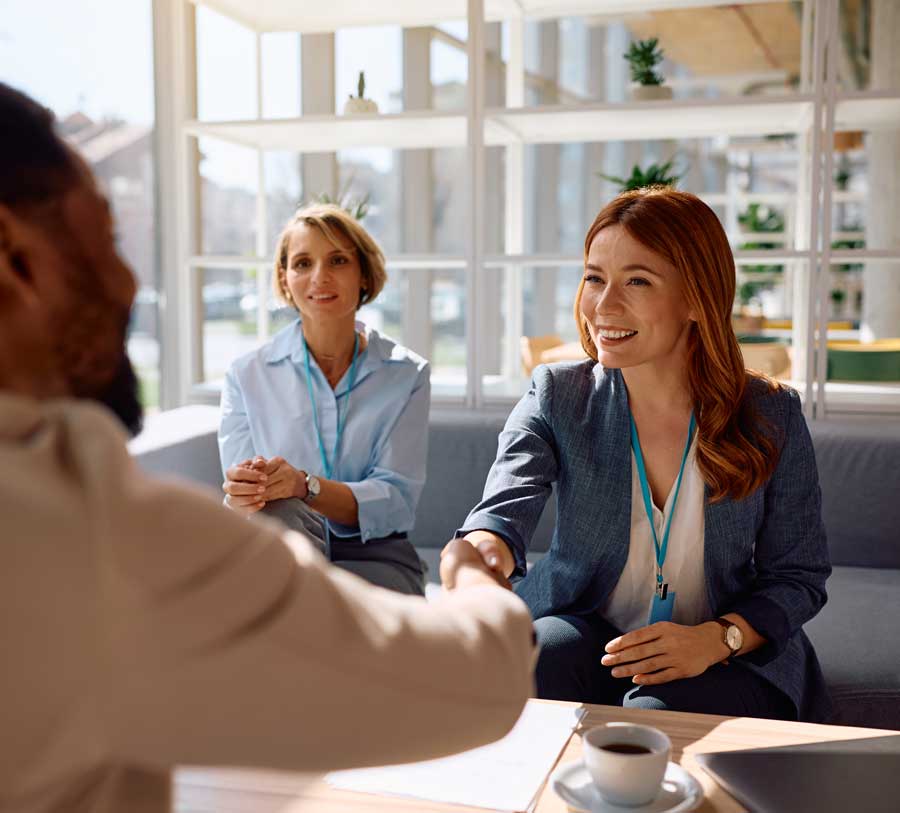 Private equity recruiter from ATG Partners meeting with candidates for a PE-backed portfolio company role